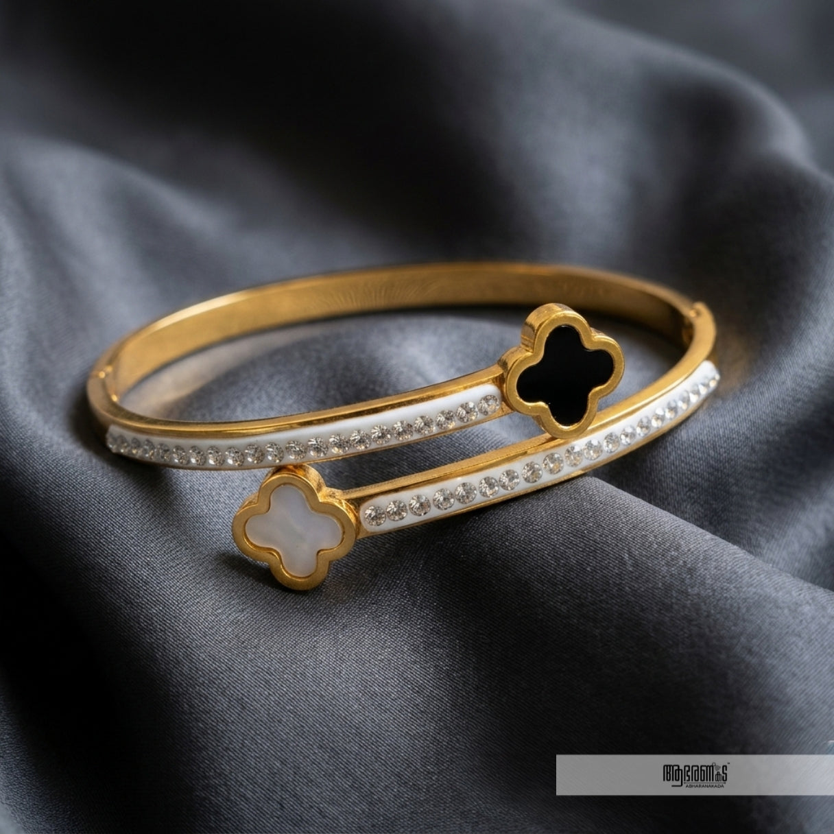 Black and White Clover Anti Tarnish Bangle Bracelet