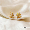 Flower look alike Stone studded Studs