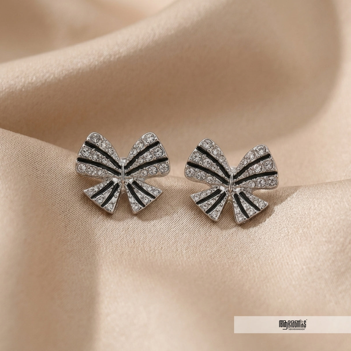 Bow Tie Rhodium Studs